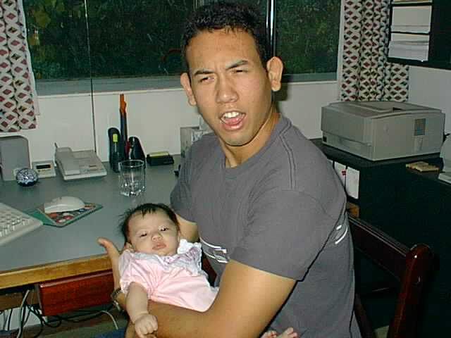 This is my friend Chris. He said he didn't know how to hold a baby but I fell asleep anyway.